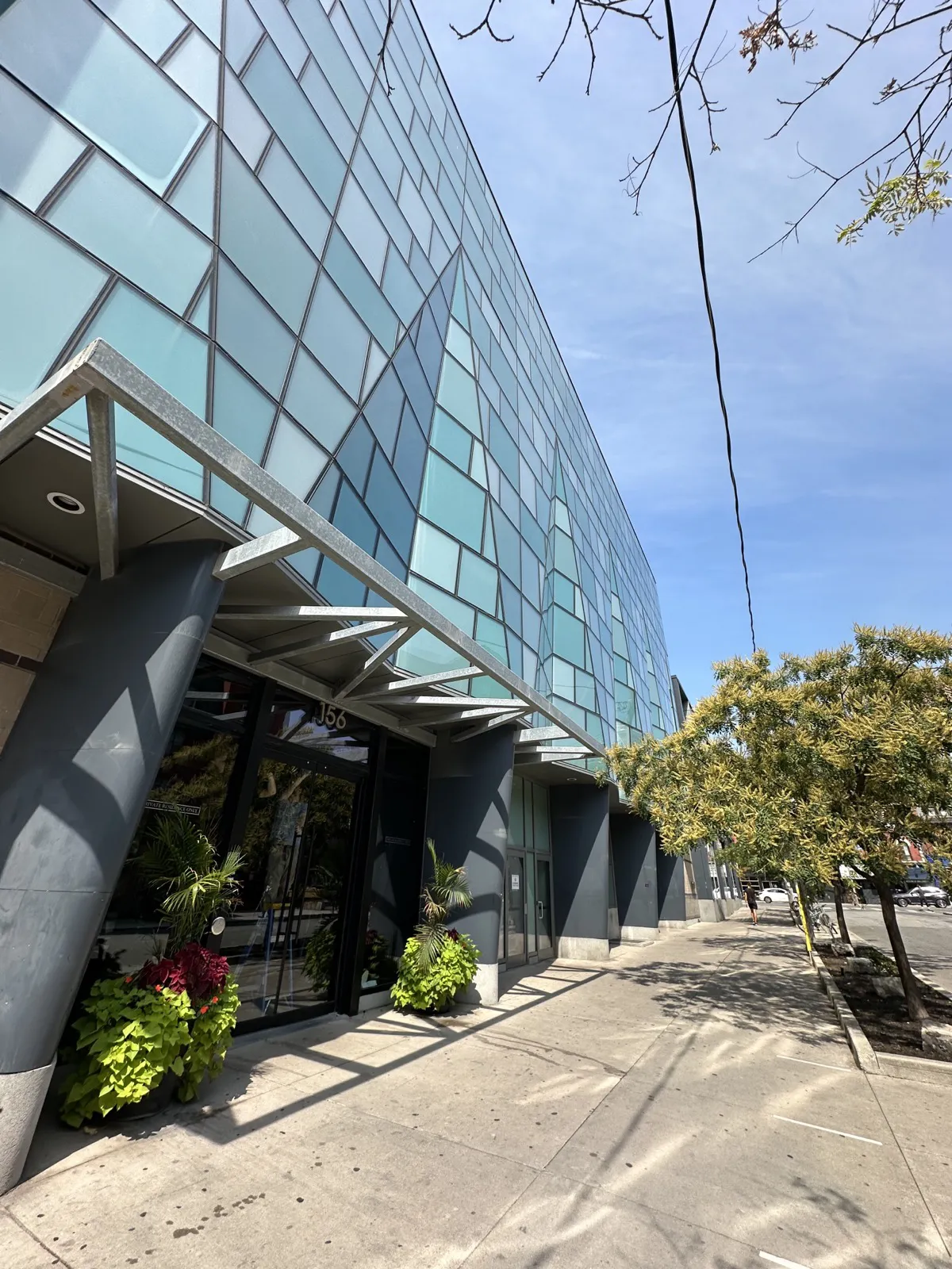 The facade of Queen & Portland Loft + Condo Residences